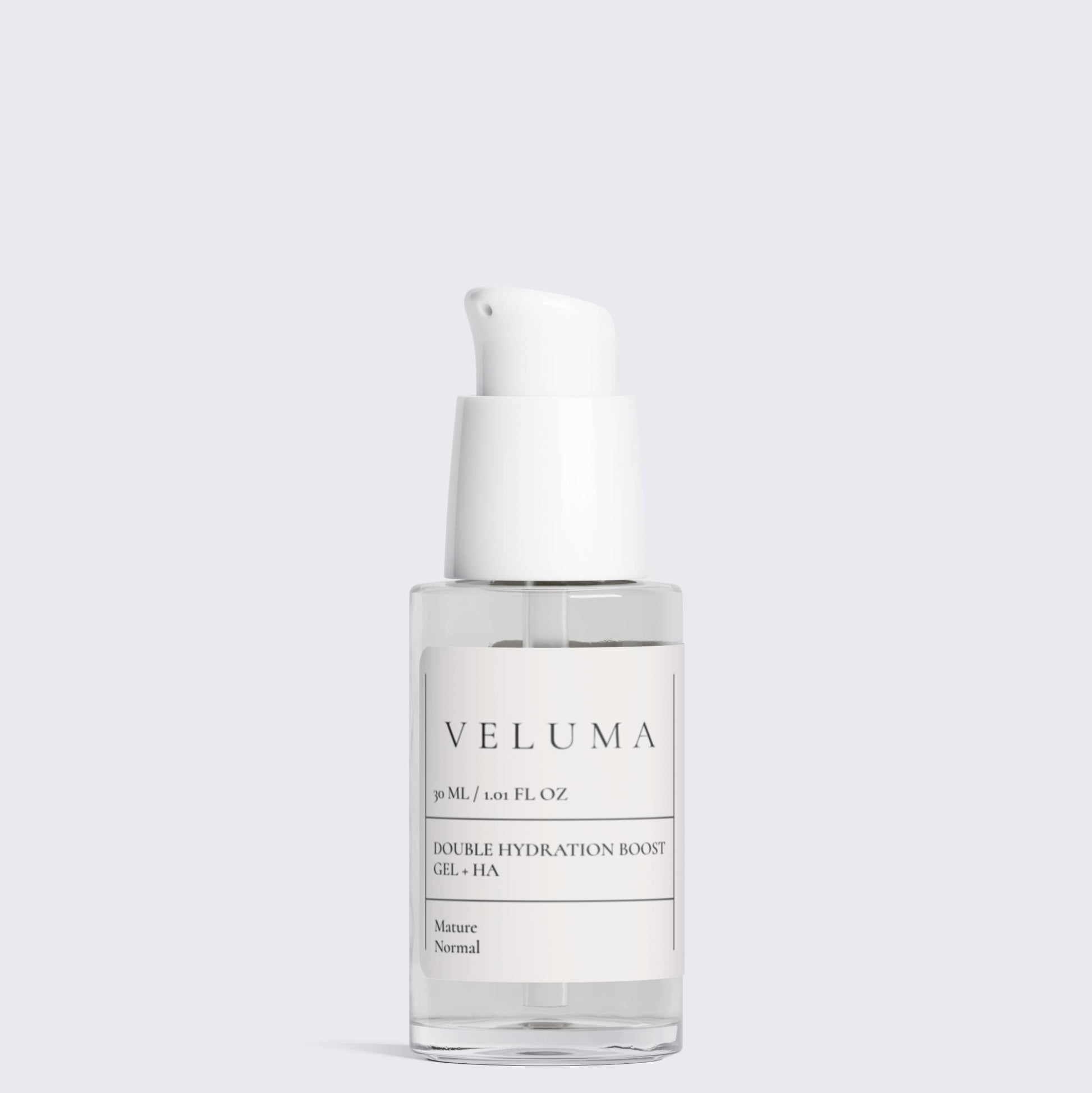 Skincare bottle labeled 'VELUMA' on a white background