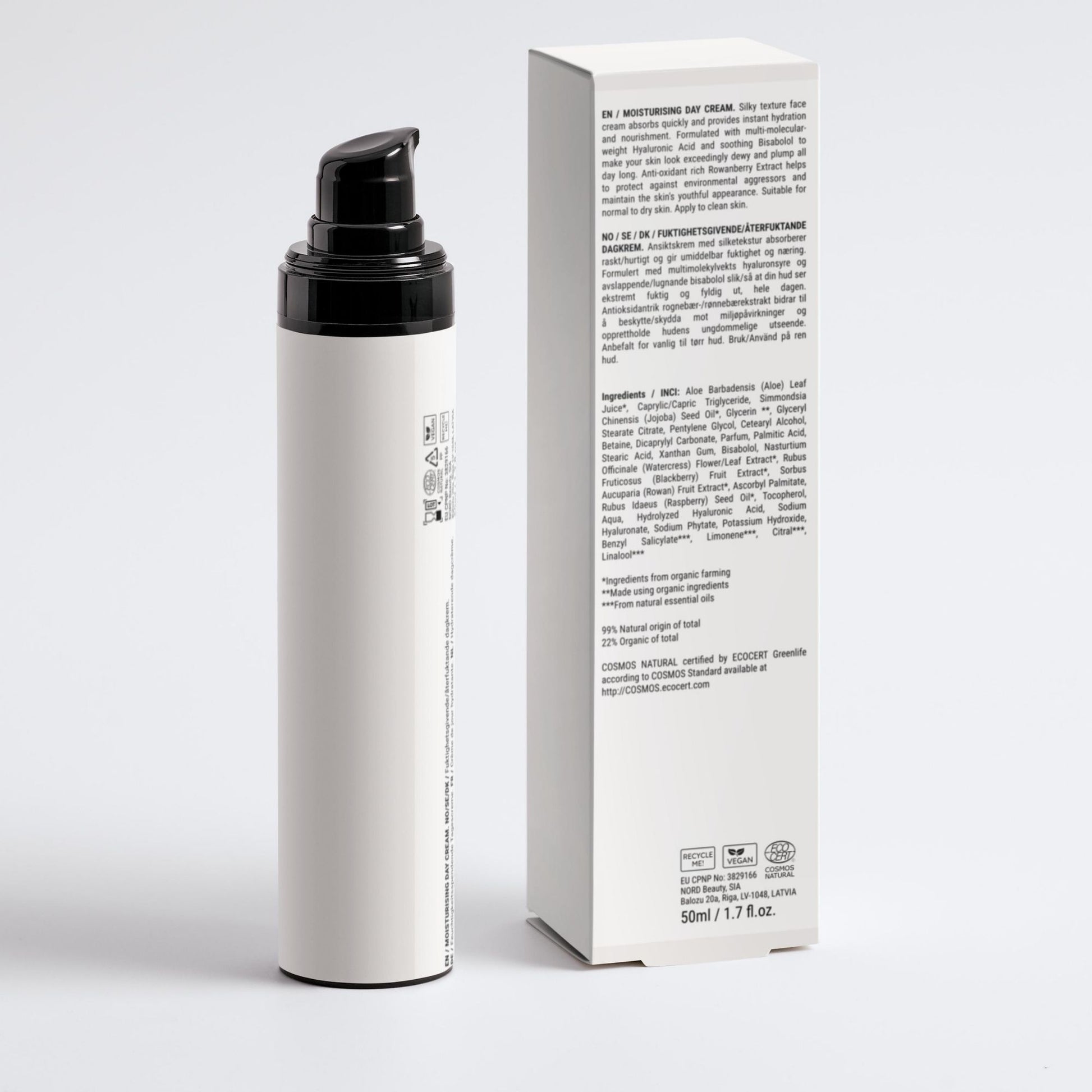Back of VELUMA Moisturising Day Cream 30ml bottle with a black pump next to its white packaging box, on a clean light gray background.
