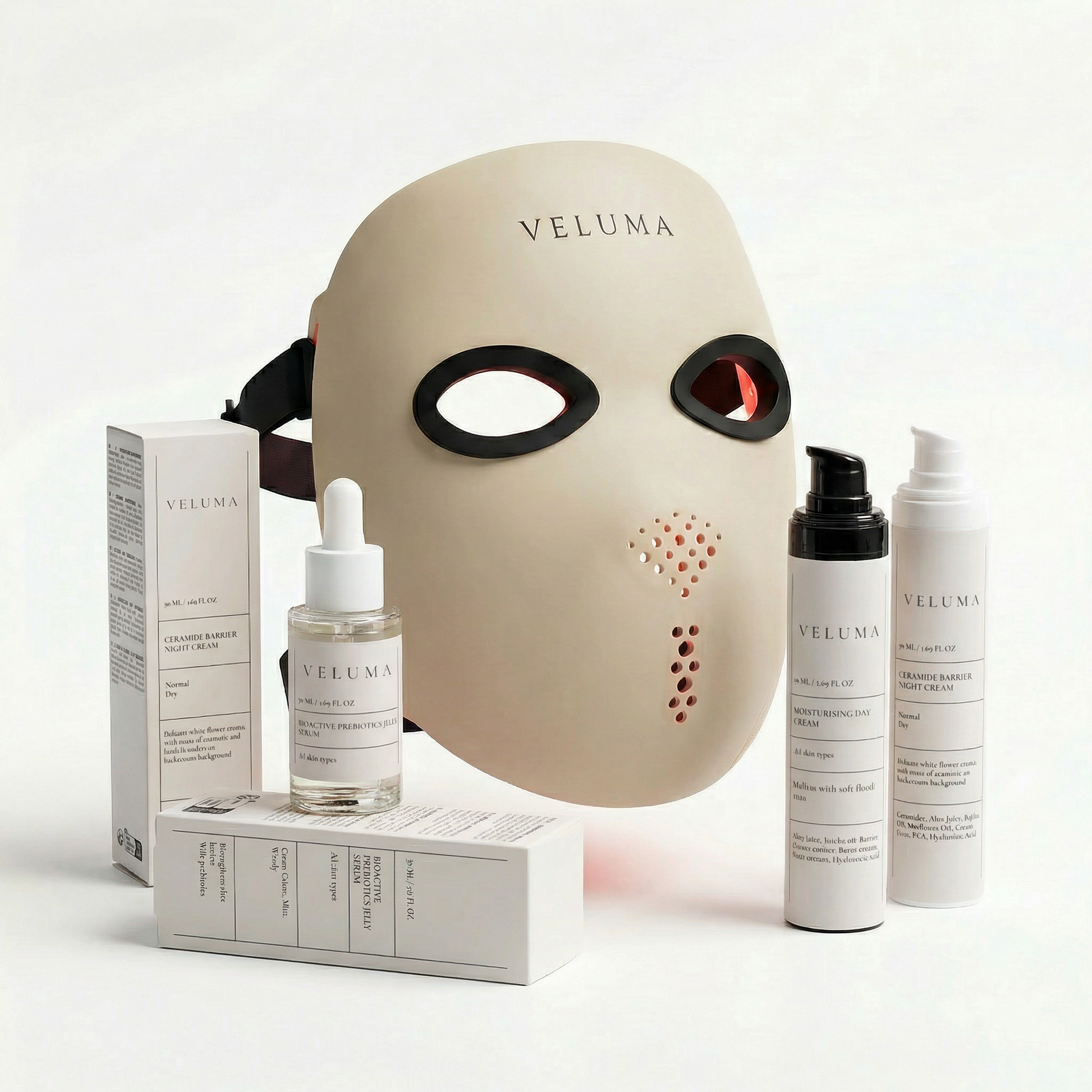 Veluma skincare products including a mask, bottles, and packaging on a white background
