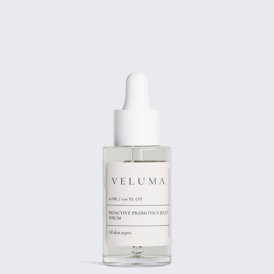 Veluma skincare serum bottle and packaging on a white background